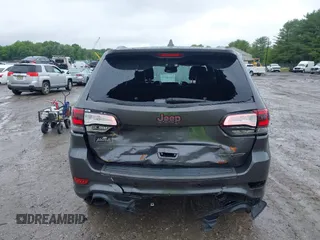 2017 Jeep Grand Cherokee Trailhawk with VIN 1C4RJFLG2HC645209, listed as a IAAI auction lot 42348470 with 170,905 mi miles and . Bid and sale history available at DreamBid. Image 16.