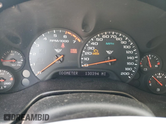 2002 Chevrolet Corvette with VIN 1G1YY22G325105745, listed as a Copart auction lot 76817784 with 130,394 mi miles and Salvage Title. Bid and sale history available at carsss.com. Image 9.