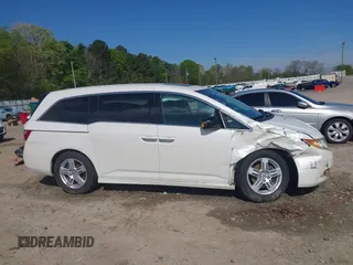 2013 Honda Odyssey Touring with VIN 5FNRL5H96DB009694, listed as a IAAI auction lot 42002487 with 182,867 mi miles and . Bid and sale history available at carsss.com. Image 13.