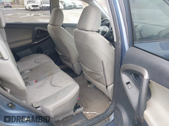 2009 Toyota RAV4 with VIN JTMBF33V09D002207, listed as a IAAI auction lot 42004330 with 198,282 mi miles. Bid and sale history available at carsss.com. Image 8.