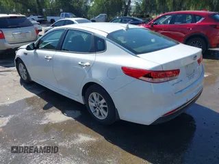 2016 Kia Optima LX with VIN 5XXGT4L3XGG054286, listed as a IAAI auction lot 41924937 with 146,555 mi miles. Bid and sale history available at carsss.com. Image 3.