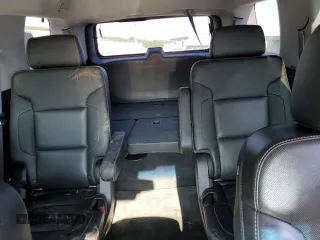 2015 Chevrolet Tahoe LTZ z VIN 1GNSKCKC5FR100084, wystawiony jako Copart lot #68003764 z przebiegiem Nie podano mil oraz Czysty tytuł • Clean title. Historia ofert i sprzedaży dostępna na DreamBid. Obrazek 10.
