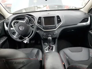 2015 Jeep Cherokee Trailhawk with VIN 1C4PJMBS0FW578199, listed as a Copart auction lot 77538544 with 122,444 mi miles and Salvage Title. Bid and sale history available at carsss.com. Image 8.