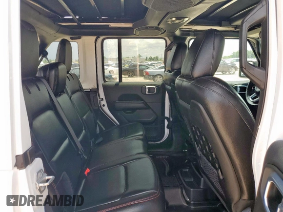 2021 Jeep Wrangler Unlimited Rubicon with VIN 1C4JJXFG1MW849460, listed as a Copart auction lot 62701895 with 54,517 mi miles and Salvage title. Bid and sale history available at DreamBid. Image 11.