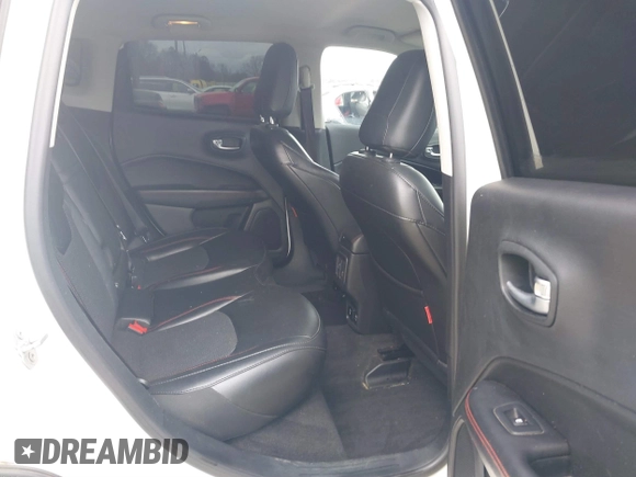 2019 Jeep Compass Trailhawk with VIN 3C4NJDDB0KT733175, listed as a IAAI auction lot 41724527 with 82,574 mi miles and . Bid and sale history available at carsss.com. Image 8.