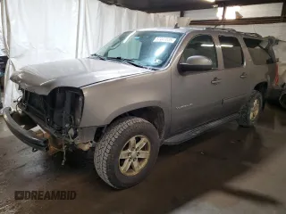 2013 GMC Yukon XL SLT z VIN 1GKS2KE75DR293016, wystawiony jako Copart lot #57447035 z przebiegiem Nie podano mil oraz Szkody całkowita. Historia ofert i sprzedaży dostępna na DreamBid. Obrazek 1.