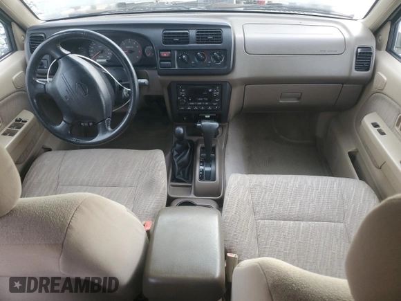 2000 Nissan Frontier XE with VIN 1N6ED27Y3YC366060, listed as a Copart auction lot 48955585 with 158,565 mi miles and Salvage title. Bid and sale history available at DreamBid. Image 8.