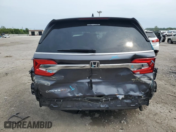 2019 Honda Odyssey EX with VIN 5FNRL6H50KB028595, listed as a Copart auction lot 65846434 with 77,596 mi miles and Salvage title. Bid and sale history available at DreamBid. Image 6.