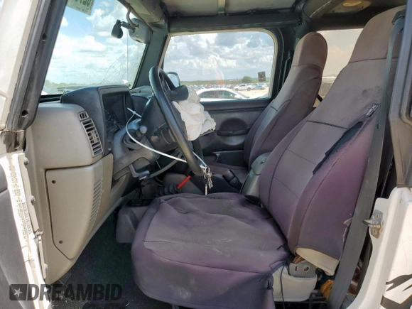 2004 Jeep Wrangler Sport z VIN 1J4FA49SX4P802341, wystawiony jako Copart lot #62752565 z przebiegiem 150 197 mil mil oraz Szkoda całkowita • Salvage title. Historia ofert i sprzedaży dostępna na DreamBid. Obrazek 7.