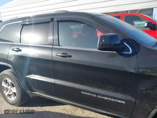 2014 Jeep Grand Cherokee Laredo with VIN 1C4RJEAG4EC136764, listed as a IAAI auction lot 41817676 with 133,943 mi miles. Bid and sale history available at carsss.com. Image 13.