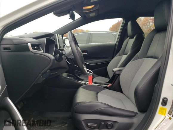 2019 Toyota Corolla Hatchback SE with VIN JTNK4RBEXK3051691, listed as a Copart auction lot 77159164 with 21,051 mi miles and Salvage Title. Bid and sale history available at carsss.com. Image 7.
