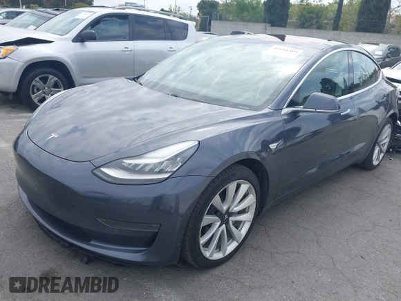 2018 Tesla Model 3 Long Range Battery with VIN 5YJ3E1EA8JF059385, listed as a IAAI auction lot 42116589 with 63,630 mi miles and . Bid and sale history available at DreamBid. Image 24.