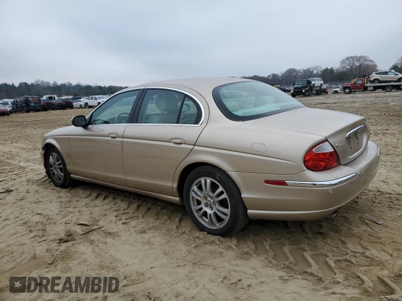 2003 Jaguar S-Type z VIN SAJEA01U33HM71782, wystawiony jako Copart lot #82969304 z przebiegiem 127 176 mil mil oraz Szkody całkowita. Historia ofert i sprzedaży dostępna na DreamBid. Obrazek 2.