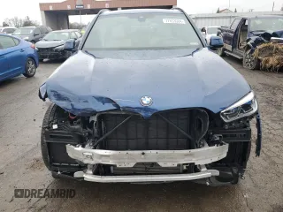 2020 BMW X5 M50i with VIN 5UXJU4C07LLE46002, listed as a Copart auction lot 77853984 with 74,098 mi miles and Salvage Title. Bid and sale history available at DreamBid. Image 5.