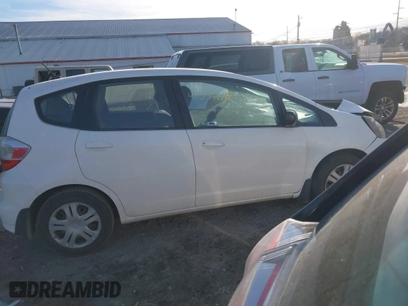 2009 Honda Fit z VIN JHMGE88249S067463, wystawiony jako IAAI lot #41354698 z przebiegiem 153 402 mil mil oraz . Historia ofert i sprzedaży dostępna na DreamBid. Obrazek 13.