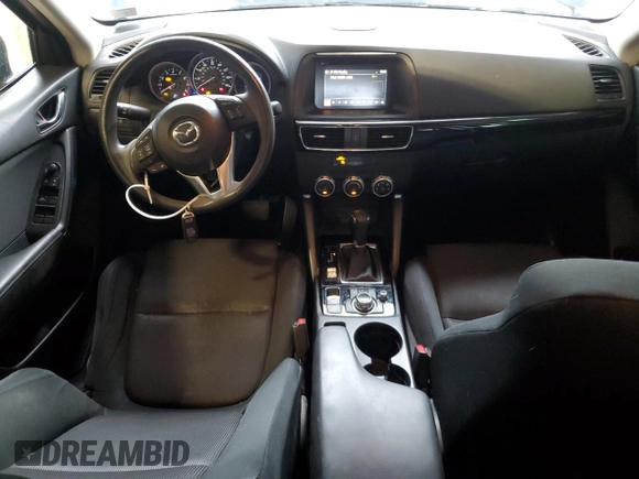 2016 Mazda CX-5 Sport z VIN JM3KE4BY0G0628372, wystawiony jako Copart lot #57534785 z przebiegiem 152 487 mil mil oraz Szkoda całkowita • Salvage title. Historia ofert i sprzedaży dostępna na DreamBid. Obrazek 8.