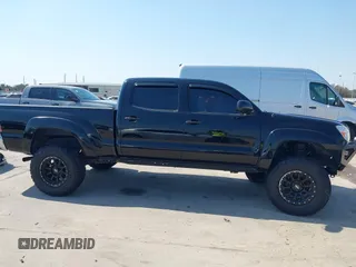 2014 Toyota Tacoma PreRunner with VIN 3TMKU4HN0EM040104, listed as a IAAI auction lot 41619179 with 171,542 mi miles and . Bid and sale history available at DreamBid. Image 13.