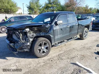 2016 Chevrolet Silverado 1500 Custom with VIN 1GCVKPEC2GZ259607, listed as a IAAI auction lot 41762877 with 105,944 mi miles. Bid and sale history available at carsss.com. Image 2.
