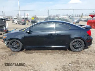 2006 Scion tC with VIN JTKDE177160077182, listed as a IAAI auction lot 41759264 with 122,324 mi miles. Bid and sale history available at carsss.com. Image 14.