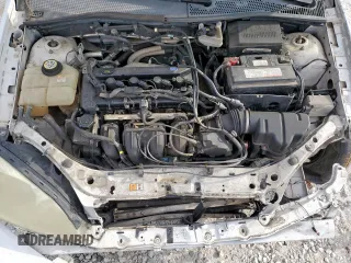 2007 Ford Focus S with VIN 1FAHP34NX7W225626, listed as a Copart auction lot 58202395 with 157,844 mi miles and Salvage title. Bid and sale history available at DreamBid. Image 11.