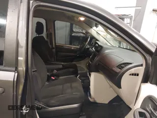 2015 Dodge Grand Caravan SE with VIN 2C4RDGBG2FR643477, listed as a IAAI auction lot 41955909 with 451,432 mi miles and . Bid and sale history available at DreamBid. Image 5.