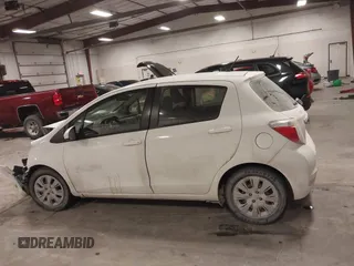 2013 Toyota Yaris L with VIN JTDKTUD33DD566664, listed as a IAAI auction lot 41524571 with 148,050 mi miles and . Bid and sale history available at DreamBid. Image 14.