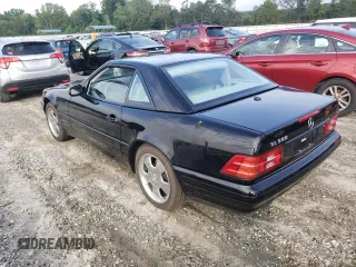 2000 Mercedes-Benz SL-Class with VIN WDBFA68F0YF190618, listed as a Copart auction lot 64791414 with 24,489 mi miles and Salvage Title. Bid and sale history available at carsss.com. Image 2.
