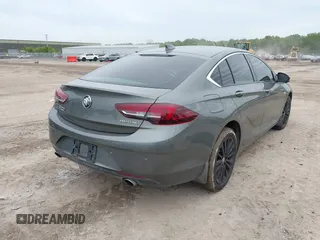 2019 Buick Regal Essence with VIN W04GP6SX6K1009087, listed as a IAAI auction lot 42318056 with 67,460 mi miles and . Bid and sale history available at DreamBid. Image 4.