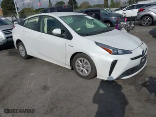2021 Toyota Prius L Eco with VIN JTDKAMFUXM3144845, listed as a IAAI auction lot 41358306 with 1 mi miles. Bid and sale history available at carsss.com. Image 1.