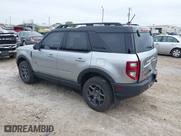 2021 Ford Bronco Sport Badlands z VIN 3FMCR9D99MRA67830, wystawiony jako IAAI lot #42318934 z przebiegiem 129 598 mil mil oraz . Historia ofert i sprzedaży dostępna na DreamBid. Obrazek 3.