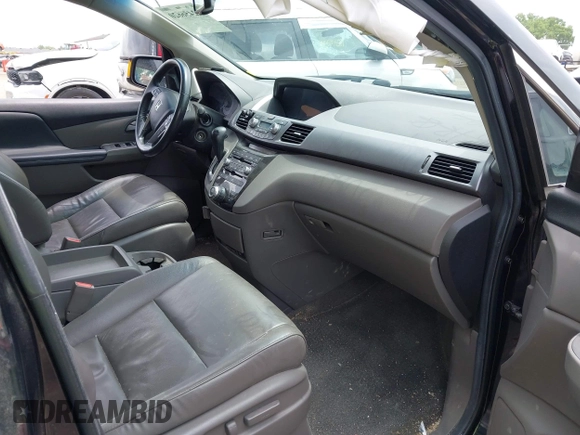 2012 Honda Odyssey Touring with VIN 5FNRL5H91CB121950, listed as a IAAI auction lot 42456620 with 200,831 mi miles and . Bid and sale history available at DreamBid. Image 5.