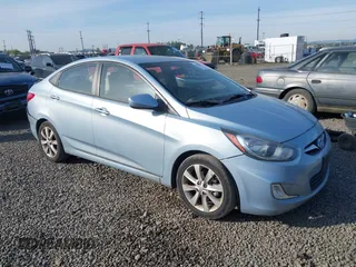 2012 Hyundai Accent GLS with VIN KMHCU4AE6CU088239, listed as a IAAI auction lot 42068997 with 132,462 mi miles. Bid and sale history available at carsss.com. Image 1.
