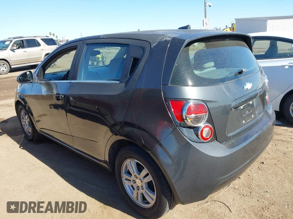 2014 Chevrolet Sonic LT with VIN 1G1JC6SH1E4111523, listed as a IAAI auction lot 41693815 with 147,353 mi miles. Bid and sale history available at carsss.com. Image 3.
