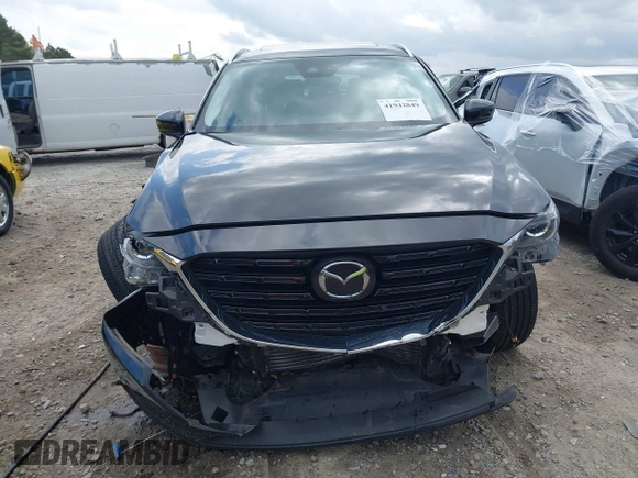 2022 Mazda CX-9 Touring Plus z VIN JM3TCBAYXN0613830, wystawiony jako IAAI lot #41942849 z przebiegiem 50 193 mil mil oraz . Historia ofert i sprzedaży dostępna na DreamBid. Obrazek 13.