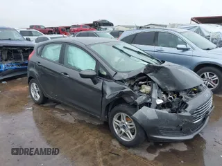 2019 Ford Fiesta SE with VIN 3FADP4EJ9KM138292, listed as a IAAI auction lot 41906774 with 76,839 mi miles. Bid and sale history available at carsss.com. Image 1.