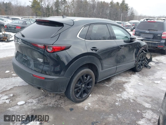2021 Mazda CX-30 Premium with VIN 3MVDMBDY1MM269353, listed as a IAAI auction lot 41644391 with 29,409 mi miles and . Bid and sale history available at carsss.com. Image 4.
