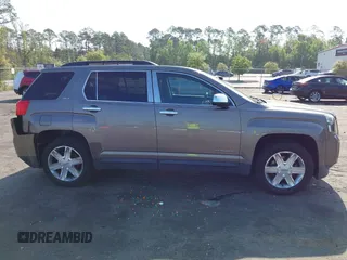2012 GMC Terrain SLT-1 z VIN 2GKALUEK8C6380606, wystawiony jako IAAI lot #41935243 z przebiegiem 123 243 mil mil oraz . Historia ofert i sprzedaży dostępna na DreamBid. Obrazek 13.