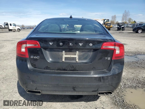2014 Volvo S60 T5 z VIN YV1612FS0E2295344, wystawiony jako Copart lot #50101125 z przebiegiem 75 959 mil mil oraz Szkody całkowita. Historia ofert i sprzedaży dostępna na DreamBid. Obrazek 6.