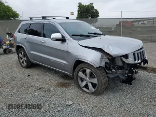 2015 Jeep Grand Cherokee Overland with VIN 1C4RJECG4FC808241, listed as a Copart auction lot 59699685 with 67,542 mi miles and Salvage title. Bid and sale history available at DreamBid. Image 4.