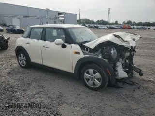 2017 MINI Hardtop 4 Door Cooper with VIN WMWXU1C56H2E17848, listed as a Copart auction lot 54599645 with 42,716 mi miles and Salvage Title. Bid and sale history available at DreamBid. Image 4.