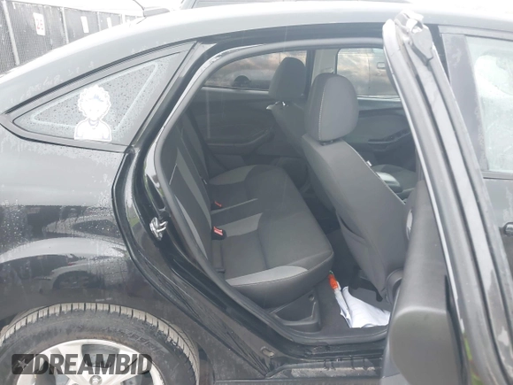 2013 Ford Focus SE with VIN 1FADP3F22DL308840, listed as a IAAI auction lot 42727900 with 112,694 mi miles and . Bid and sale history available at DreamBid. Image 8.