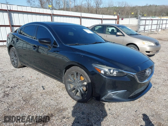 2016 Mazda 6 i Grand Touring with VIN JM1GJ1W50G1478699, listed as a IAAI auction lot 41711211 with 208,720 mi miles and . Bid and sale history available at DreamBid. Image 1.