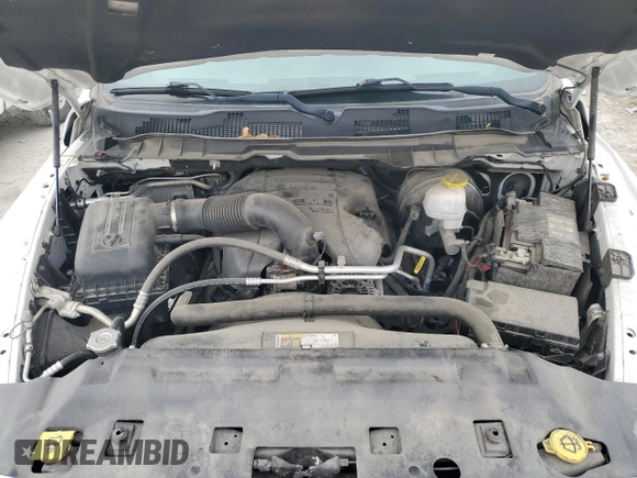 2018 Ram 1500 Lone Star Silver with VIN 1C6RR6LT6JS266013, listed as a Copart auction lot 56895915 with 136,453 mi miles and Salvage title. Bid and sale history available at DreamBid. Image 11.