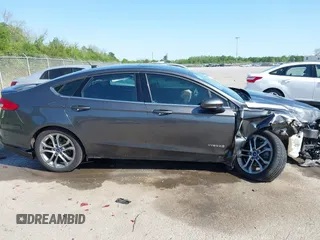 2017 Ford Fusion Hybrid SE with VIN 3FA6P0LU0HR195992, listed as a IAAI auction lot 42007452 with 78,578 mi miles and . Bid and sale history available at DreamBid. Image 13.