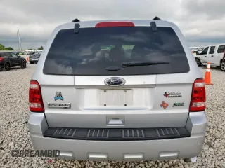 2012 Ford Escape XLT z VIN 1FMCU9DG5CKA92739, wystawiony jako Copart lot #62380375 z przebiegiem 68 755 mil mil oraz Szkoda całkowita • Salvage title. Historia ofert i sprzedaży dostępna na DreamBid. Obrazek 6.