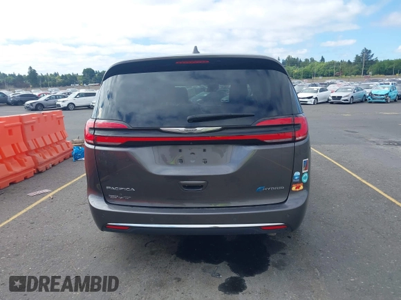 2022 Chrysler Pacifica Hybrid Limited with VIN 2C4RC1S72NR123083, listed as a IAAI auction lot 42623725 with 36,789 mi miles and . Bid and sale history available at DreamBid. Image 16.