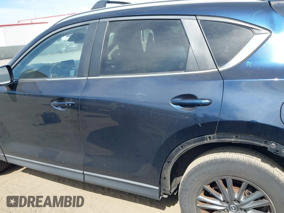 2017 Mazda CX-5 Touring z VIN JM3KFBCL5H0133493, wystawiony jako IAAI lot #39666644 z przebiegiem 125 048 mil mil oraz . Historia ofert i sprzedaży dostępna na DreamBid. Obrazek 15.