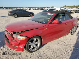 2010 BMW 1 Series 128i with VIN WBAUL7C5XAVJ77407, listed as a Copart auction lot 75903634 with 127,619 mi miles and Salvage title. Bid and sale history available at DreamBid. Image 1.