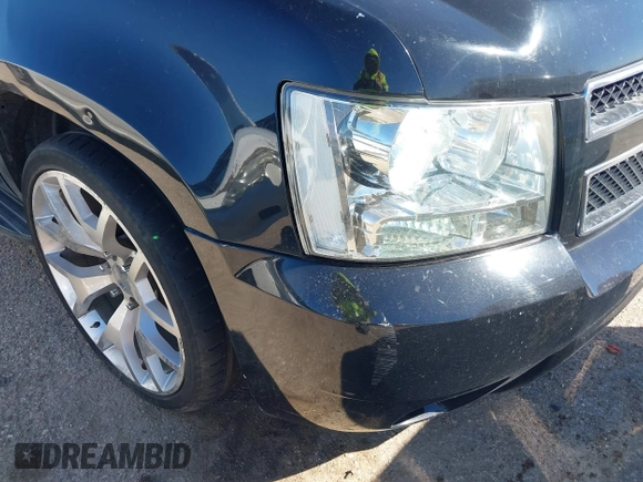 2007 Chevrolet Tahoe LTZ with VIN 1GNFC13J67R245233, listed as a IAAI auction lot 41726159 with 203,841 mi miles and . Bid and sale history available at DreamBid. Image 12.