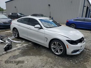2018 BMW 4 Series 430i with VIN WBA4J1C54JBG79837, listed as a Copart auction lot 61041275 with 106,541 mi miles and Salvage title. Bid and sale history available at DreamBid. Image 4.
